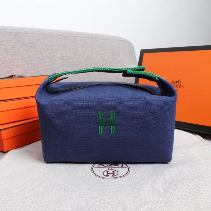 H**mes clutch bags